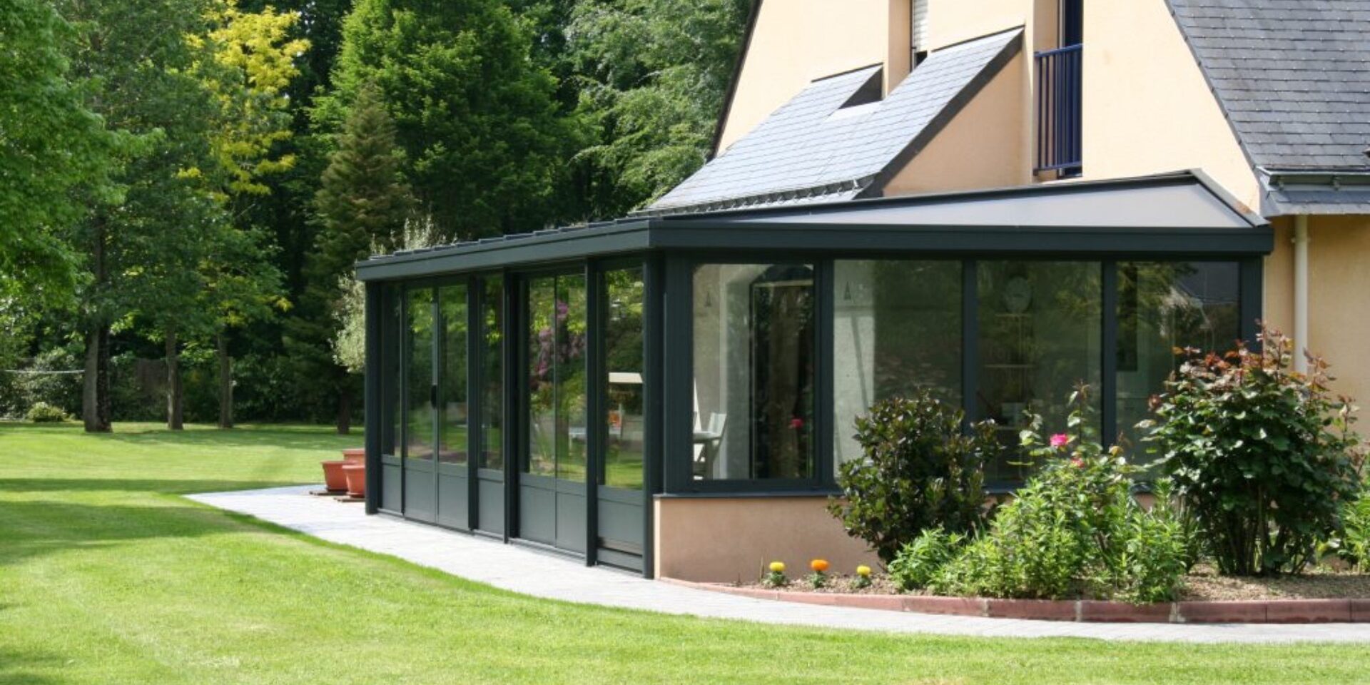 véranda menuisier auch